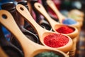 Close-up of wooden spoons with variety of spices for cooking and seasoning food Royalty Free Stock Photo