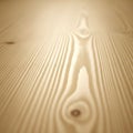 Close-up of a wooden surface featuring light brown grain patterns Royalty Free Stock Photo