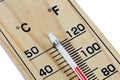Close-up wooden thermometer scale isolated white background.