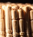 Close up of wooden toothpicks on a black background. Royalty Free Stock Photo