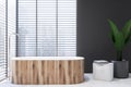 Close up of wooden tub in gray bathroom Royalty Free Stock Photo