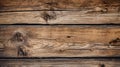 Close-up of wooden wall, with some nails sticking out. There are also two pieces of wood on top of wall