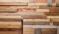 A close up of a wooden wall with various planks