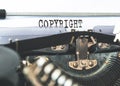 Close-up of word COPYRIGHT written on old typewriter