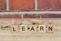 Word learn on wood block Royalty Free Stock Photo