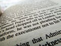 Close up of words on a book with the words `executioner` in focus