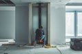 Close-up of a worker focused on setting up a modern energy-efficient chimney system