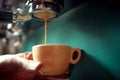 Close up of a worker making coffee