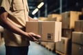 close up a worker moving Package Boxes on Pallet in Warehouse, hands visible. AI Generated