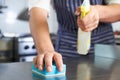 Close Up Of Worker In Restaurant Kitchen Cleaning Down After Service Royalty Free Stock Photo