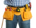 Close-up on worker's toolbelt