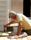 Close up Worker Staining Deck