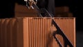 Close up of a worker using a block cutting automatic saw to prepare ceramic blocks for building process. Stock footage Royalty Free Stock Photo