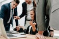 Close up. working group together pointing at the laptop screen Royalty Free Stock Photo