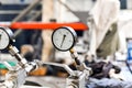 Close-up of a working pressure gauge of a hydraulic oil station in a workshop