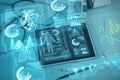 Close up of workplace with tablet, supplies, stethoscope, glowing blue medical interface. Healthcare, technology, medicine and Royalty Free Stock Photo