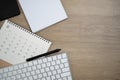 workspace desk with calendar and computer keyboard with copy space background, minimal style, for creative flat lay Royalty Free Stock Photo