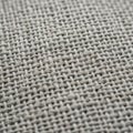 Close up of a woven fabric featuring a simple tight knit pattern Royalty Free Stock Photo