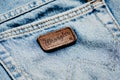 Closeup of Wrangler label on blue jeans.