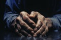 Close-up of the wrinkled hands of an elderly person peacefully folded in clear water