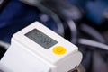 Close up of wrist blood pressure monitor showing normal blood pressure, medical concept Royalty Free Stock Photo