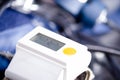 Close up of wrist blood pressure monitor showing normal blood pressure, medical concept Royalty Free Stock Photo