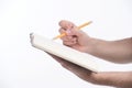 Close-up of writing. Close-up of human hands holding a pencil an