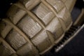 Detail of WW2 hand grenade against a black background. Royalty Free Stock Photo