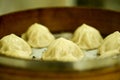 Close-up of the Xiao Long Bao or soup dumpling in bamboo steamers. Royalty Free Stock Photo