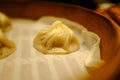 Close-up of the Xiao Long Bao or soup dumpling in bamboo steamers. Royalty Free Stock Photo