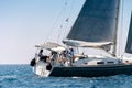 Close-up of a yacht with crew in open sea