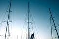 Close-up of yacht masts against the blue sky. Marine theme Royalty Free Stock Photo