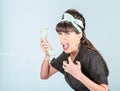 Close Up of Yelling Retro Woman in Black Dress with Phone Receiver Royalty Free Stock Photo