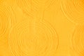 Close-up yellow abstract background gypsum panel, spiral-shaped volumetric, yellow circles, futuristic background Royalty Free Stock Photo