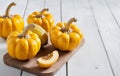 Rustic Autumn Still Life with Small Yellow Pumpkins Royalty Free Stock Photo