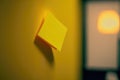 Close-up of a yellow adhesive sticker on yellow wall, ai generated Royalty Free Stock Photo