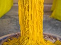 Close up yellow candle drippings Royalty Free Stock Photo