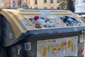 Close-up of a yellow container where plastic waste and other packaging are collected in Valencia (Spain