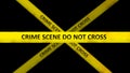 Close-up of yellow crime scene tape with the words CRIME SCENE DO NOT CROSS