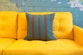 Close up of yellow fabric sofa and cushions Royalty Free Stock Photo