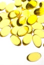 Close up of yellow gel capsules. Royalty Free Stock Photo