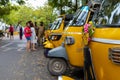 Close-up on yellow motor rickshaw fronts, Pondicherry, India