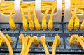 Close up of yellow network cables connected to switch Royalty Free Stock Photo