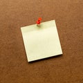 Close up yellow post note paper on the wood board Royalty Free Stock Photo