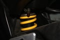 Close up of yellow sport motorcycle suspension