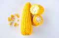 Close up yellow sweet  Ripe corn  and kernels on white background Royalty Free Stock Photo