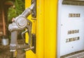 Close up of Yellow vintage fuel dispenser