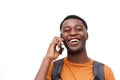 Close up young african american man laughing with cellphone against isolated white background Royalty Free Stock Photo
