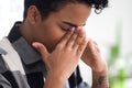 Upset black businesswoman feels unwell sitting in office Royalty Free Stock Photo