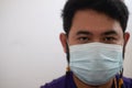 Asian man wearing protective face mask against coronavirus Royalty Free Stock Photo